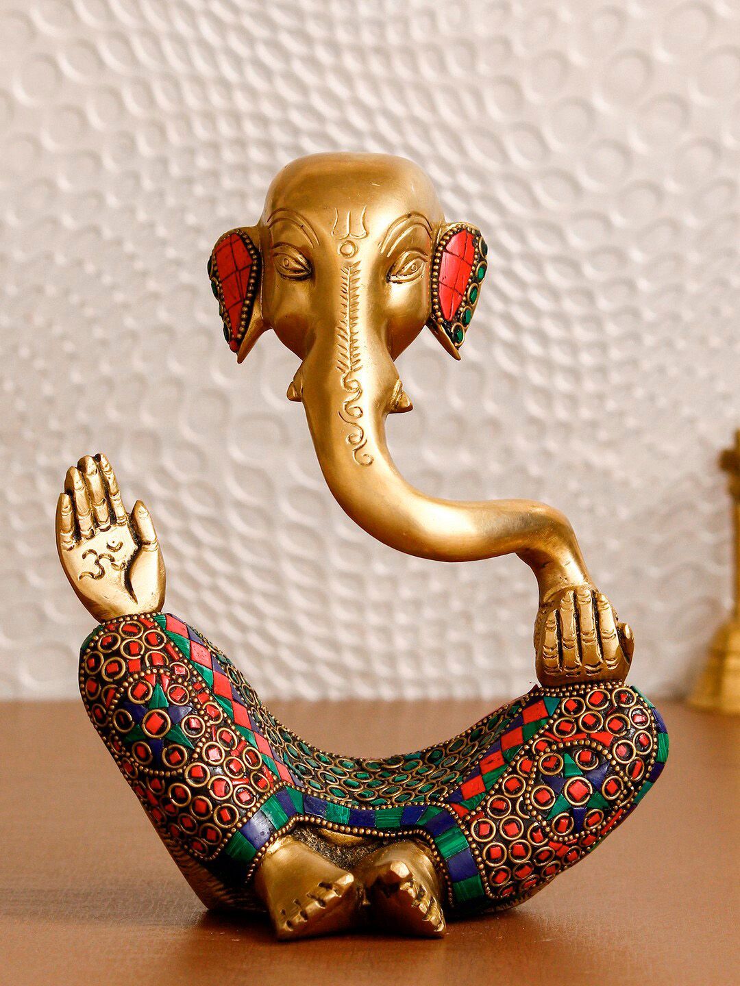 eCraftIndia Gold-Toned & Orange Meditating Lord Ganesha Handcrafted Idol Showpiece Price in India
