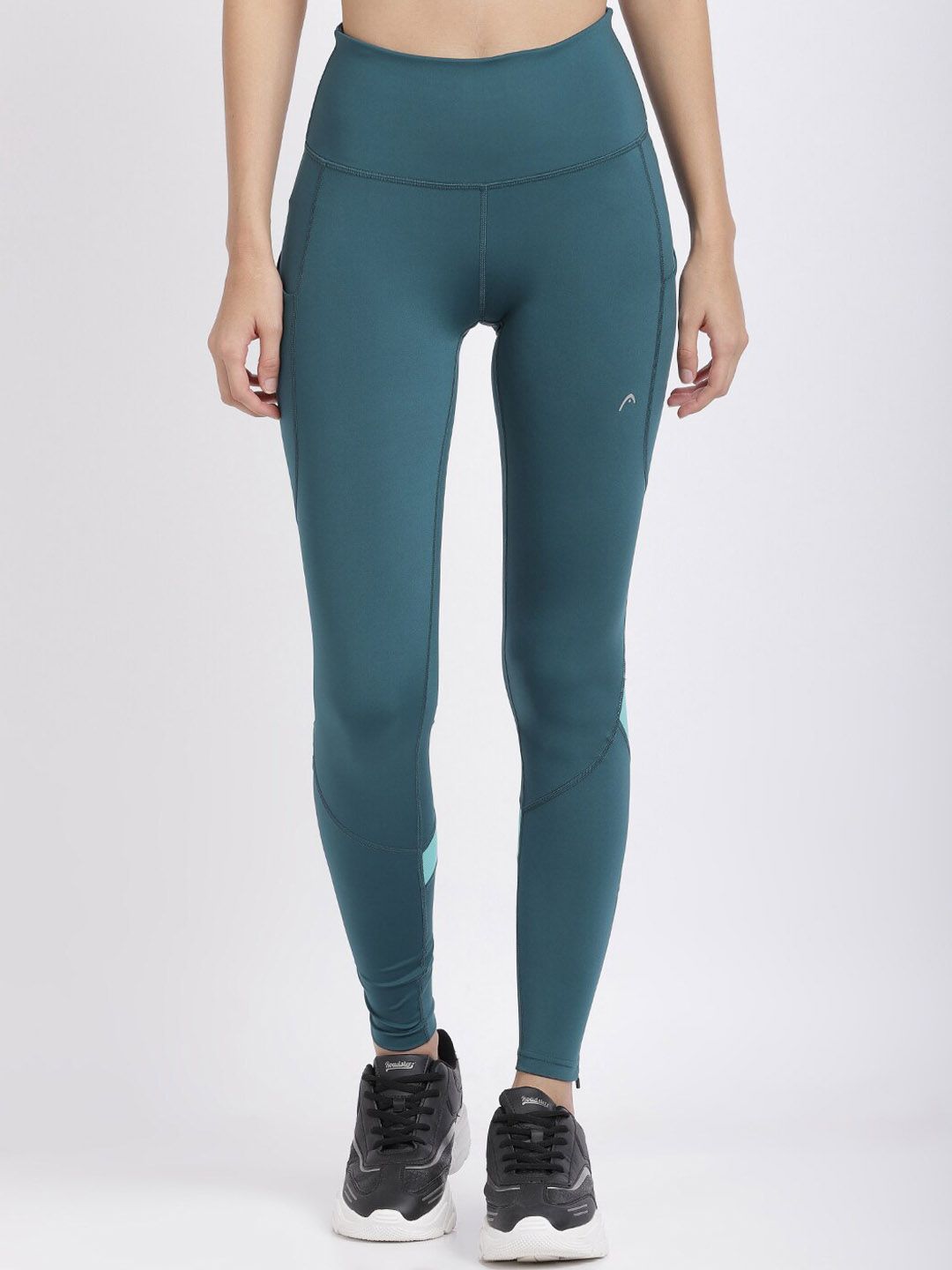 Head Women Teal Solid Knitted Tights Price in India