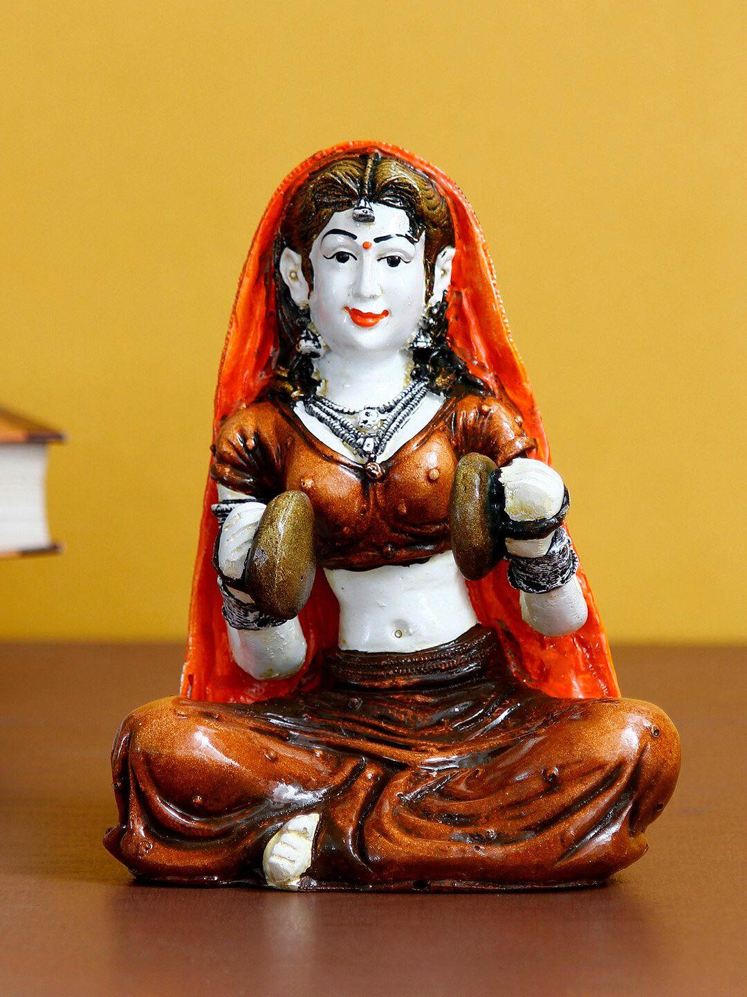 eCraftIndia Red & Beige Rajasthani Lady Playing Hand Cymbals Handcrafted Polyresin Showpiece Price in India