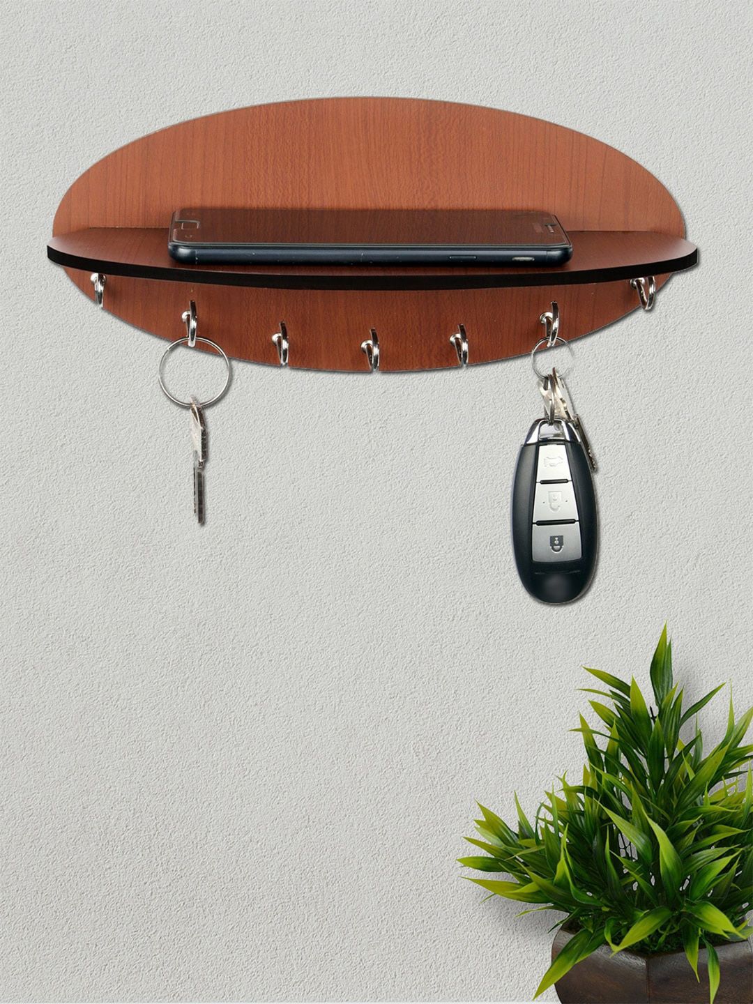 ROMEE Brown Solid Wooden Key Holder With Oval Shelf Price in India