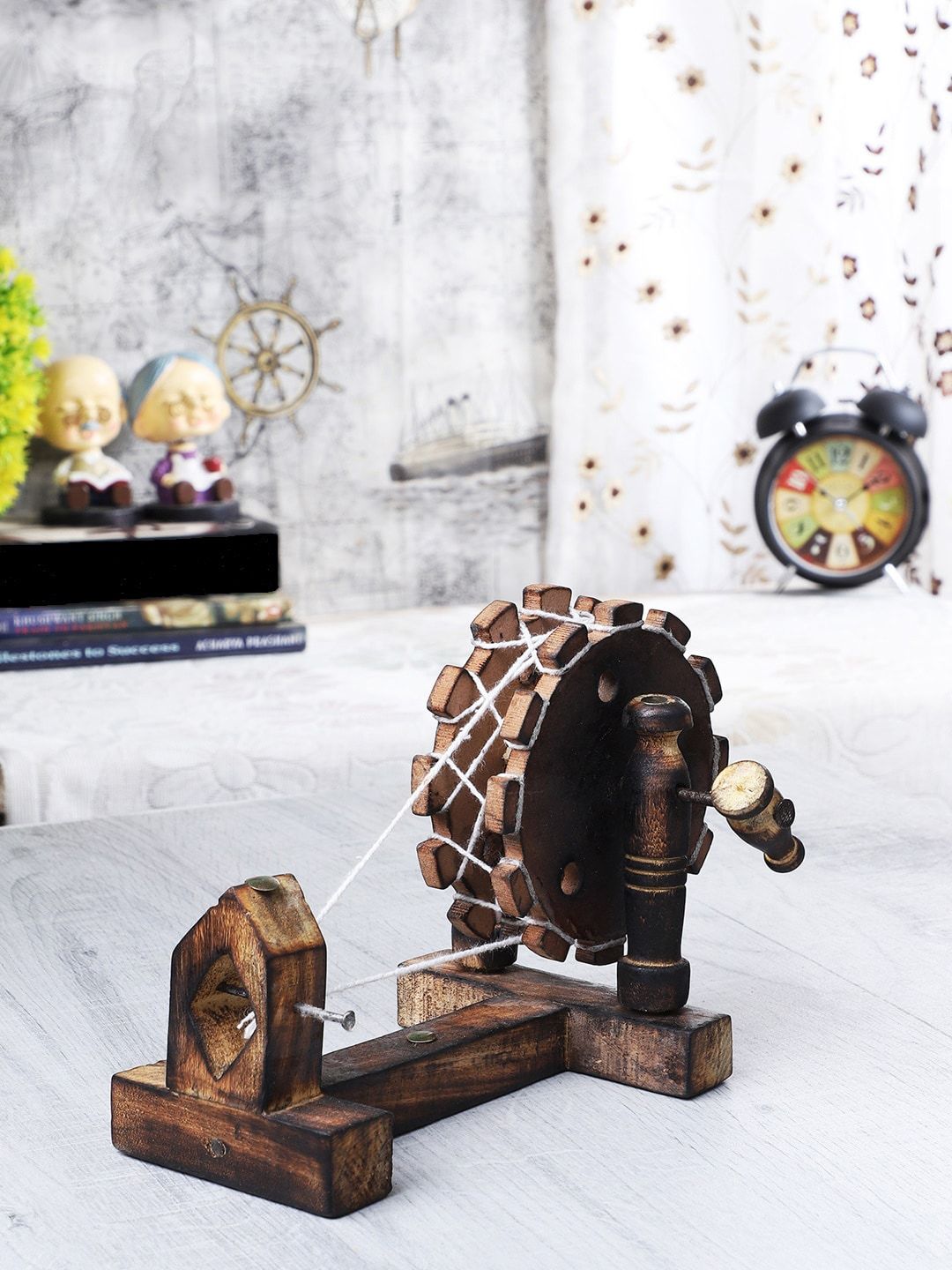 EXIM DECOR Brown Solid Handcrafted Spinning Wheel Showpiece Price in India