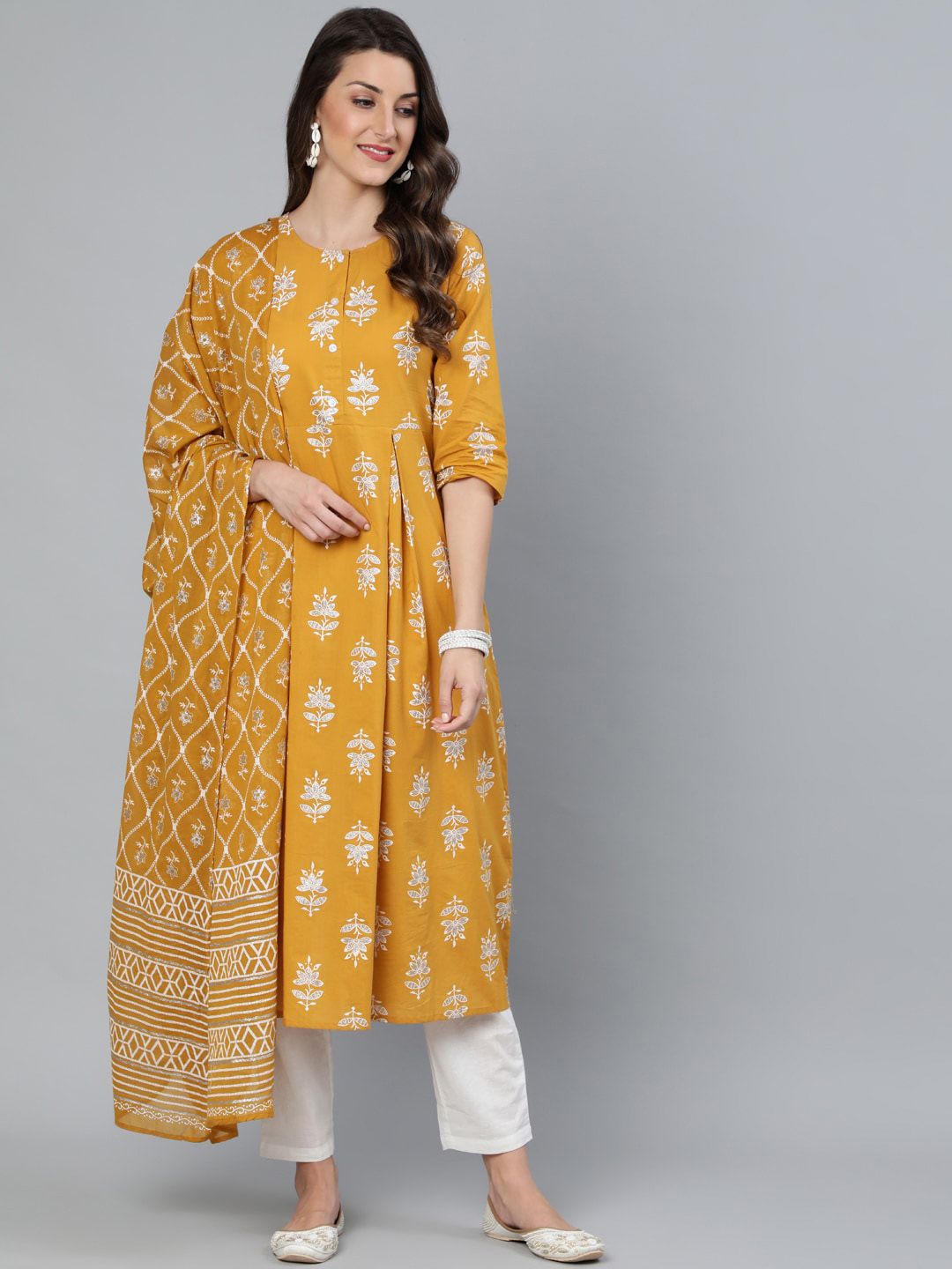 Nayo Women Mustard & Silver Printed Box Pleated Kurta With Trouser  & Dupatta Price in India