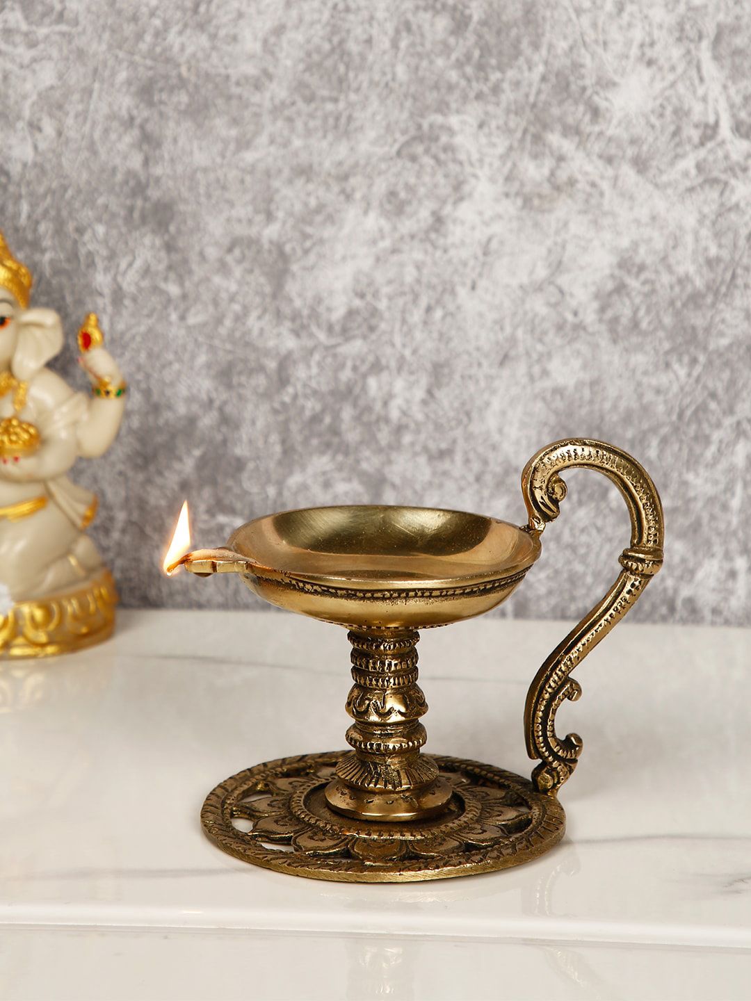 CraftVatika Gold-Toned Handmade Oil Lamp Showpiece Price in India