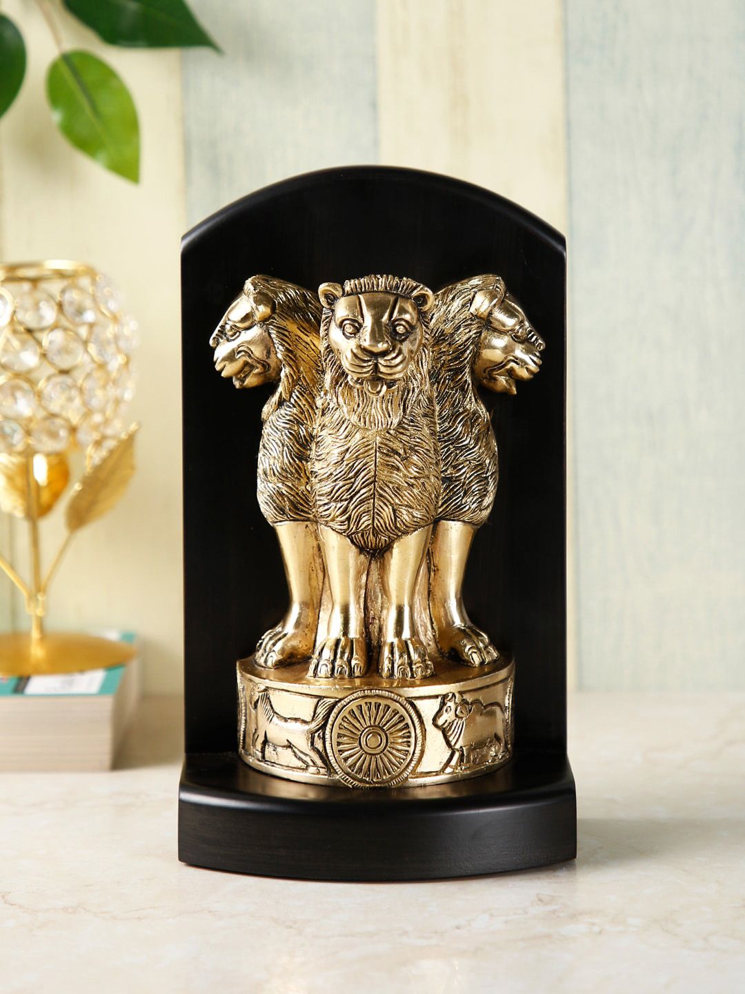 CraftVatika Gold-Toned & Brown Ashok Chakra Pillar Showpiece Price in India