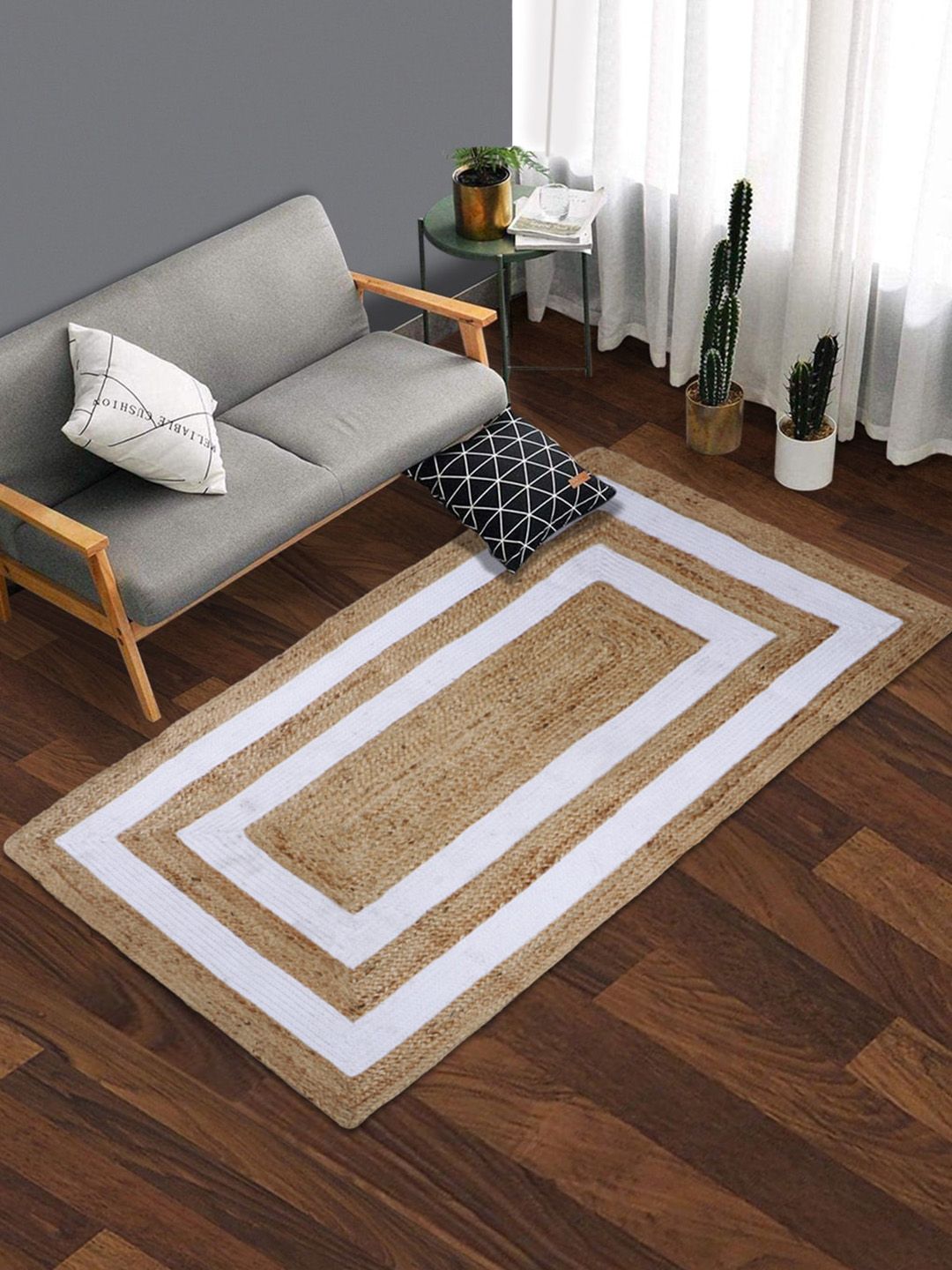 HomeStorie Beige & White Geometric Handmade Cotton Jute Carpet Price in India