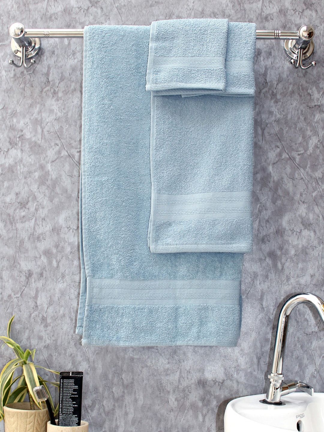 AVI Living Blue Set Of 4 Solid 400 GSM Quick Dry Anti-Microbial Towel Set Price in India