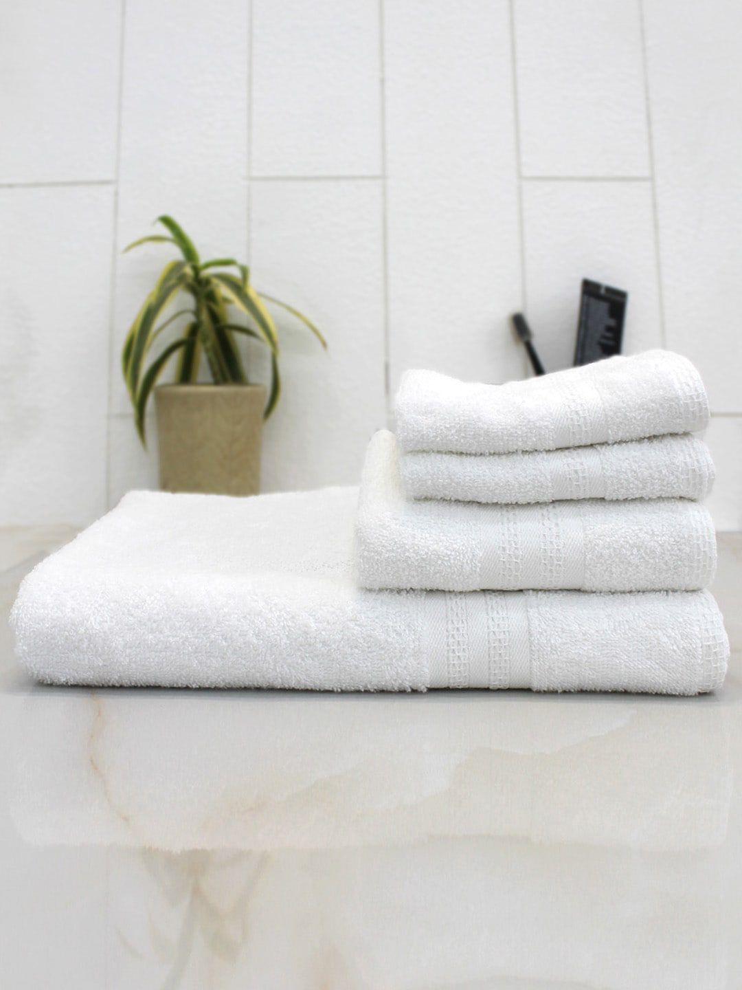 AVI Living White Set Of 4 Solid Quick-Dry 400 GSM Anti-Microbial Towels Price in India