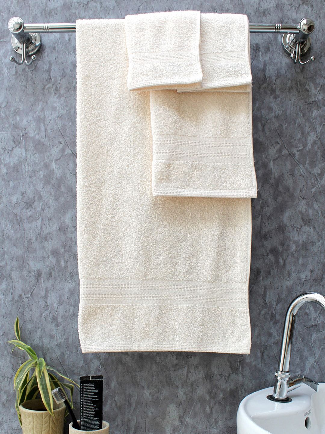 AVI Living Off-White Set Of 4 Solid Quick Dry 400 GSM Anti-Microbial Towel Set Price in India