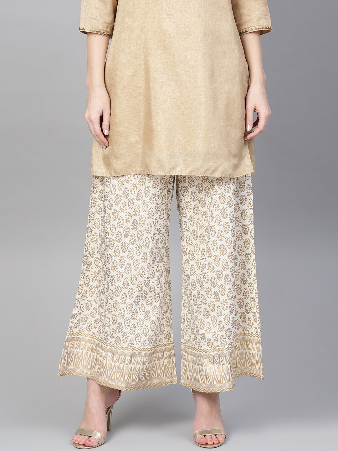 Varanga Women Off-White & Gold-Toned Printed Wide Leg Palazzos Price in India