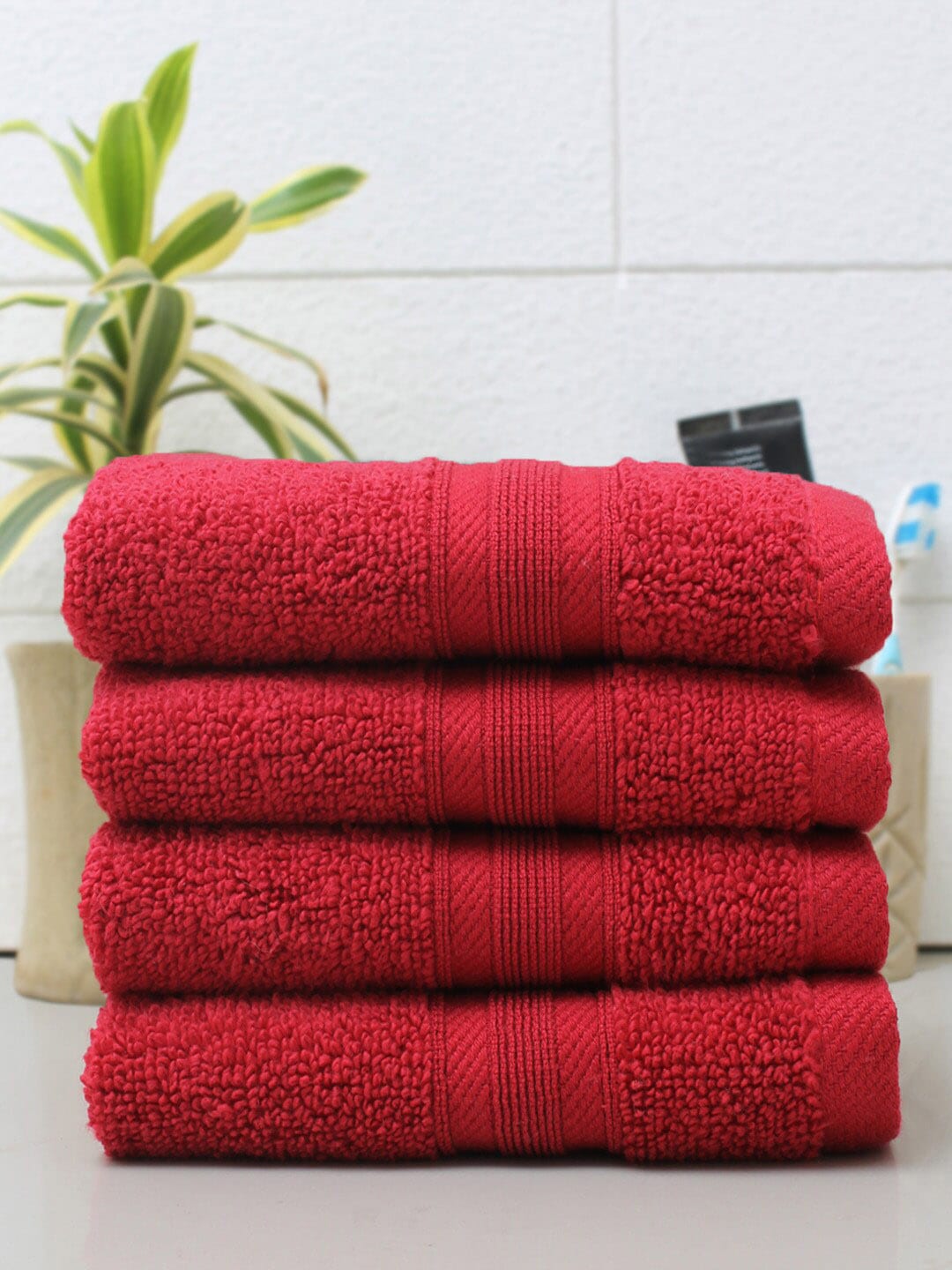 AVI Living Set Of 4 Red Cotton Solid 550 GSM Face Towels Price in India