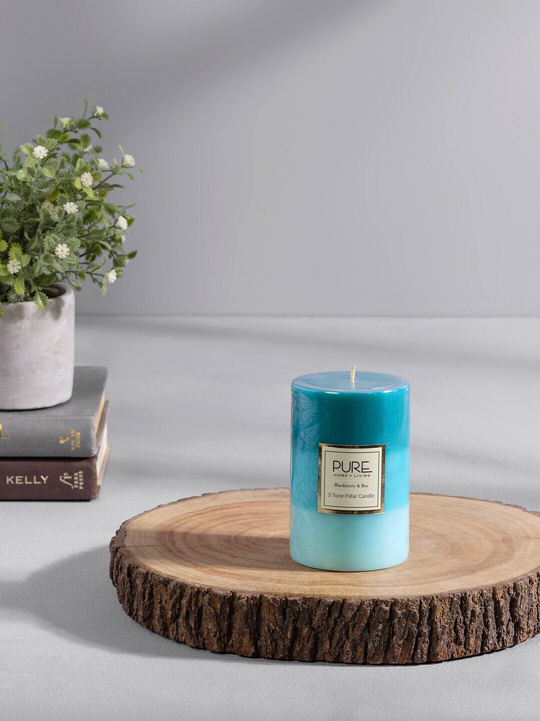 Pure Home and Living Blue Aqua Blackberry And Bay Pillar Tall Candle Price in India