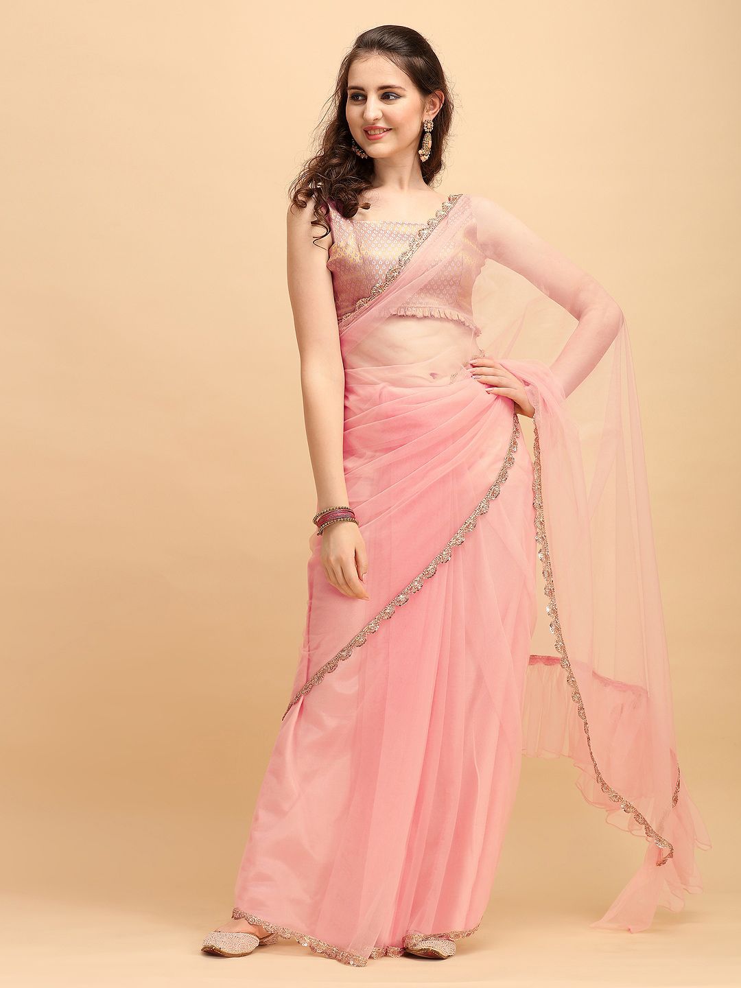 Sangria Pink Solid Net Ruffled Saree Price in India