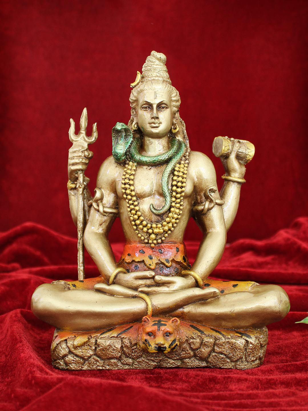 TIED RIBBONS Gold-Toned & Orange Lord Shiva Blessing Sitting Pose Handcrafted Resin Showpiece Price in India