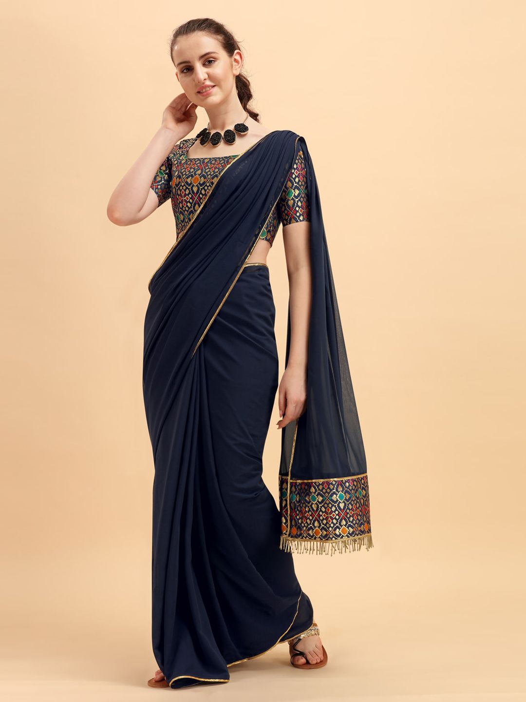 Sangria Navy Blue Solid Saree Price in India