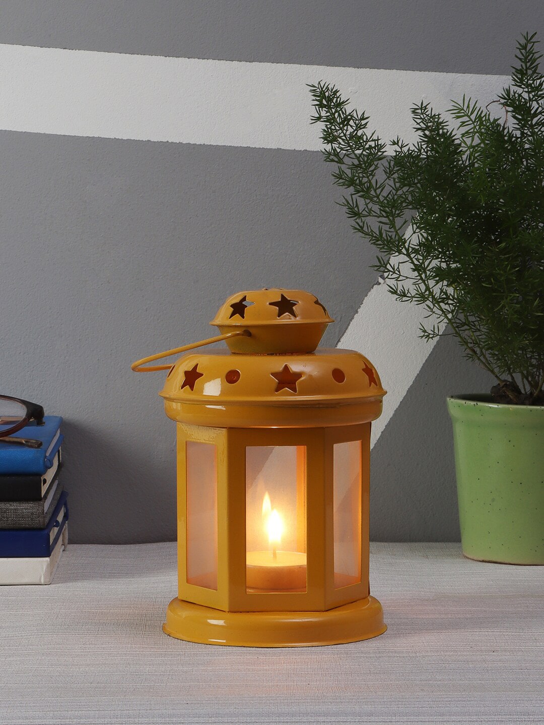 EXIM DECOR Yellow Solid Traditional Table Lantern Price in India