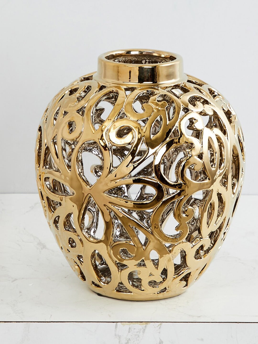 Home Centre Gold-Toned Stellar Celestial Carved Vase Price in India