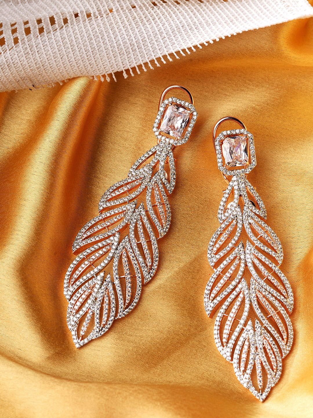 Saraf RS Jewellery White & Rose Gold-Plated AD Feather Shaped Drop Earrings Price in India