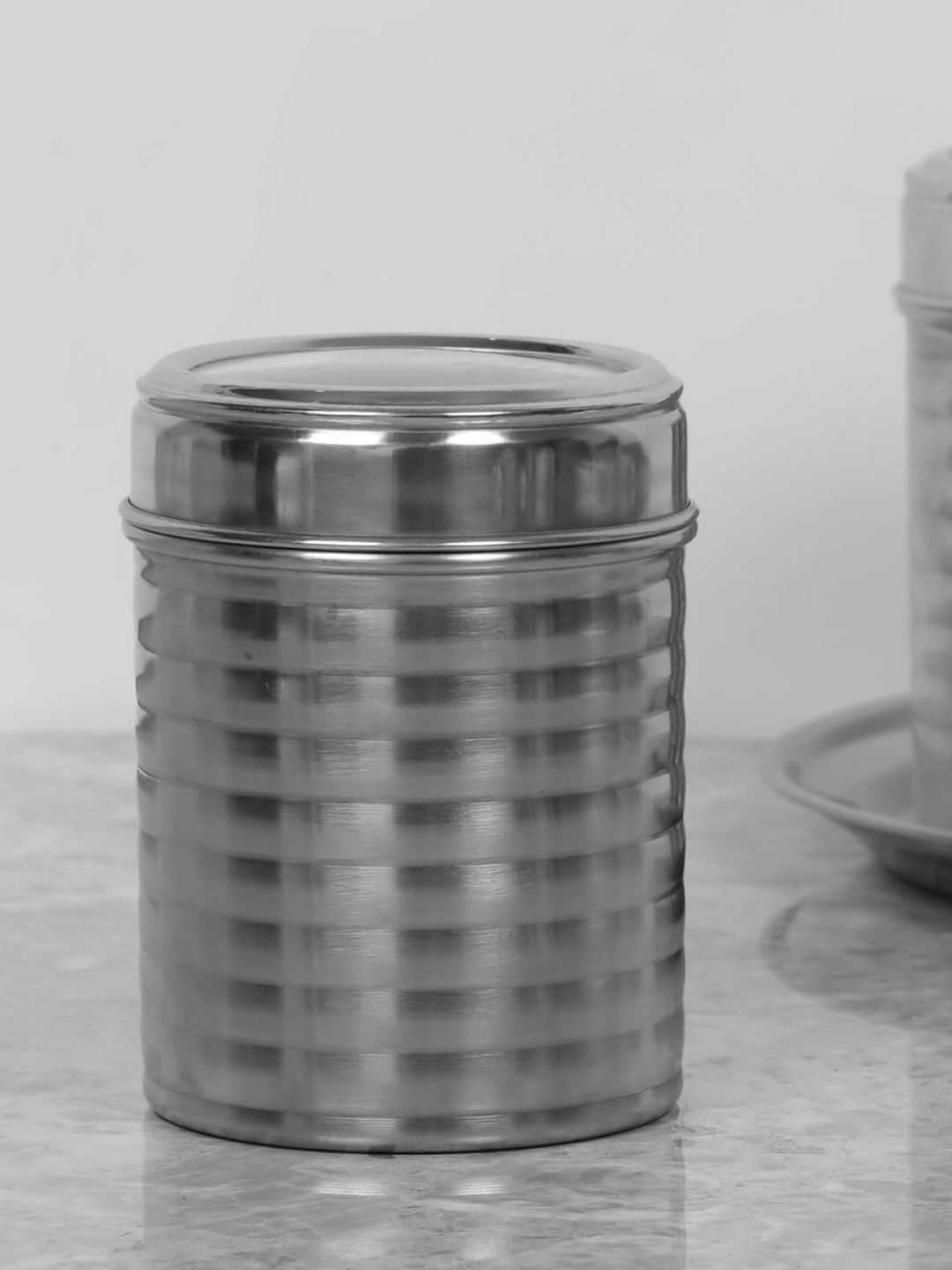 Home Centre Silver-Toned Striped Stainless Steel Canister with Matt Finish Price in India