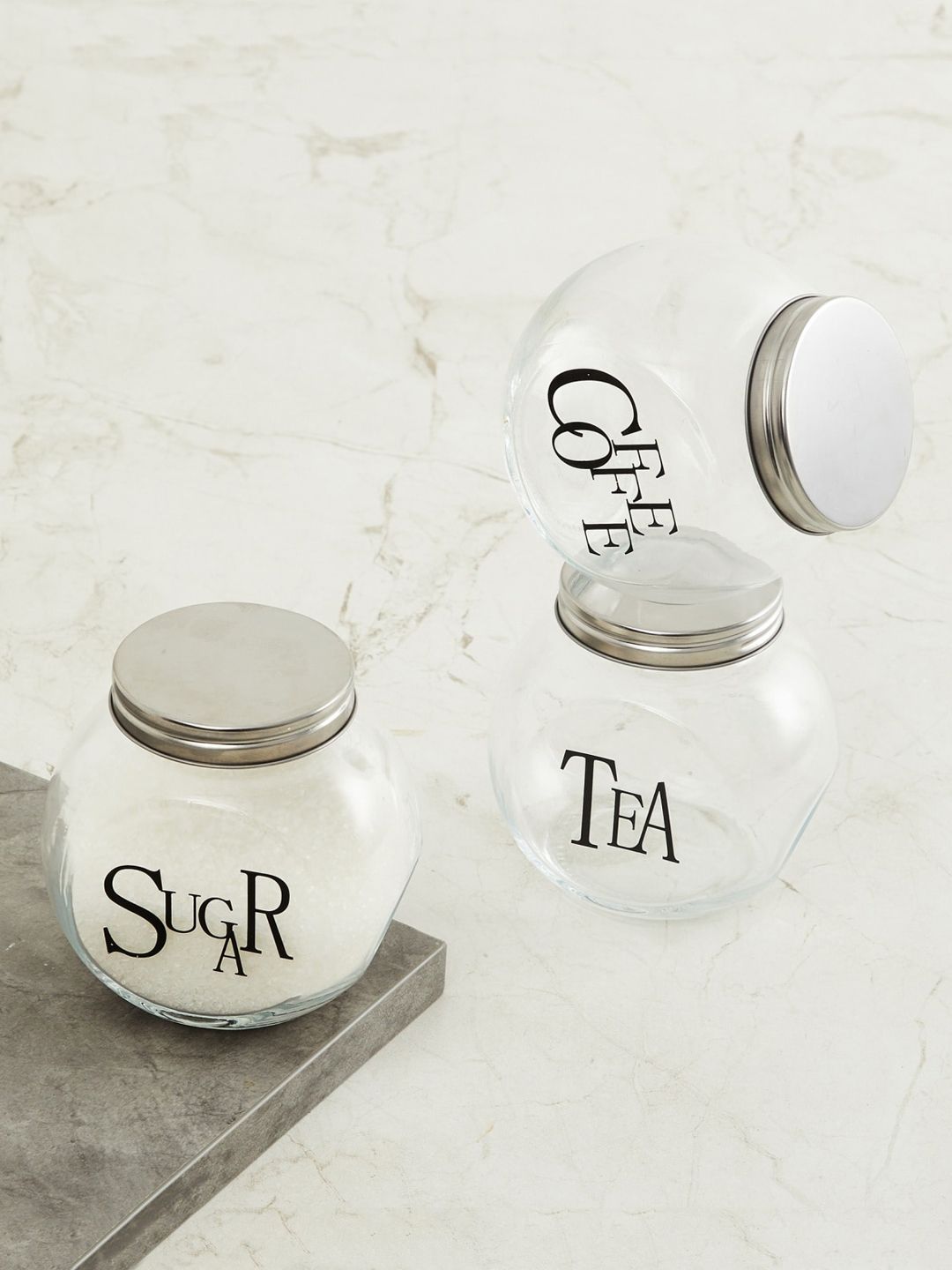 Home Centre Set Of 3 Transparent & Black Typography Printed Glass Jars Price in India