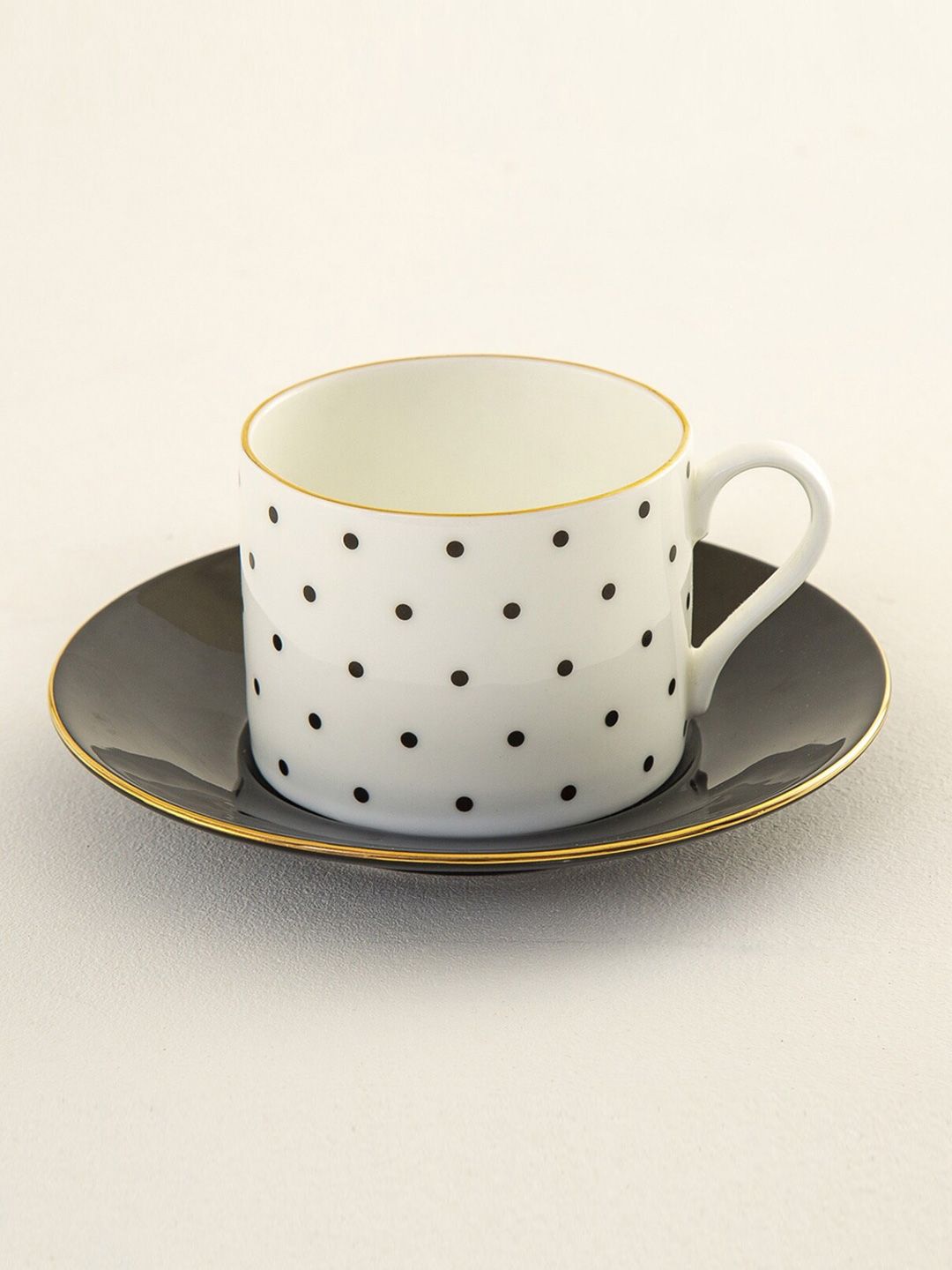 Home Centre White & Black Printed Bone China Cup and Saucer Set Price in India