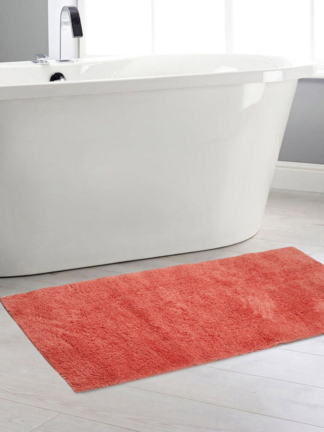 Home Centre Peach-Coloured Solid Rectangular Bath Rug Price in India