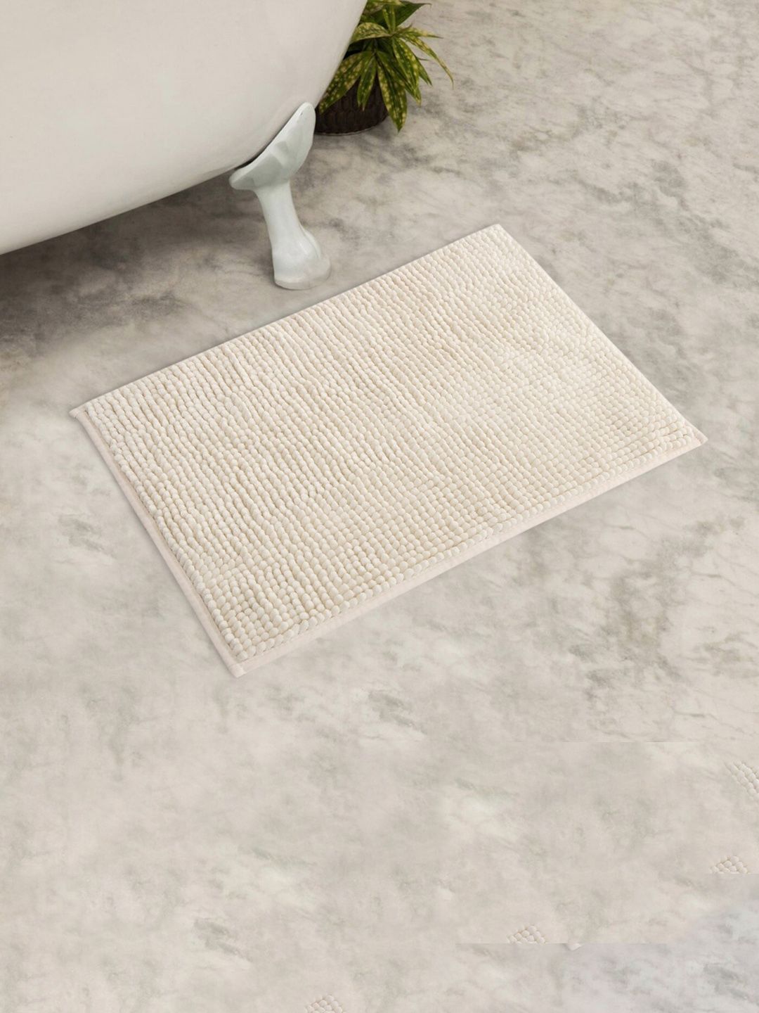 Home Centre Beige Solid Marshmallow Textured Poppy Rectangular Bath Rug Price in India
