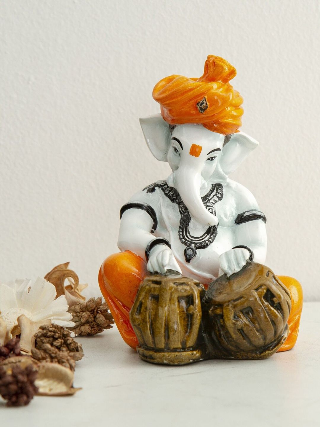 Home Centre White & Orange Corsica Polyresin Ganesha Figurine Showpiece Price in India