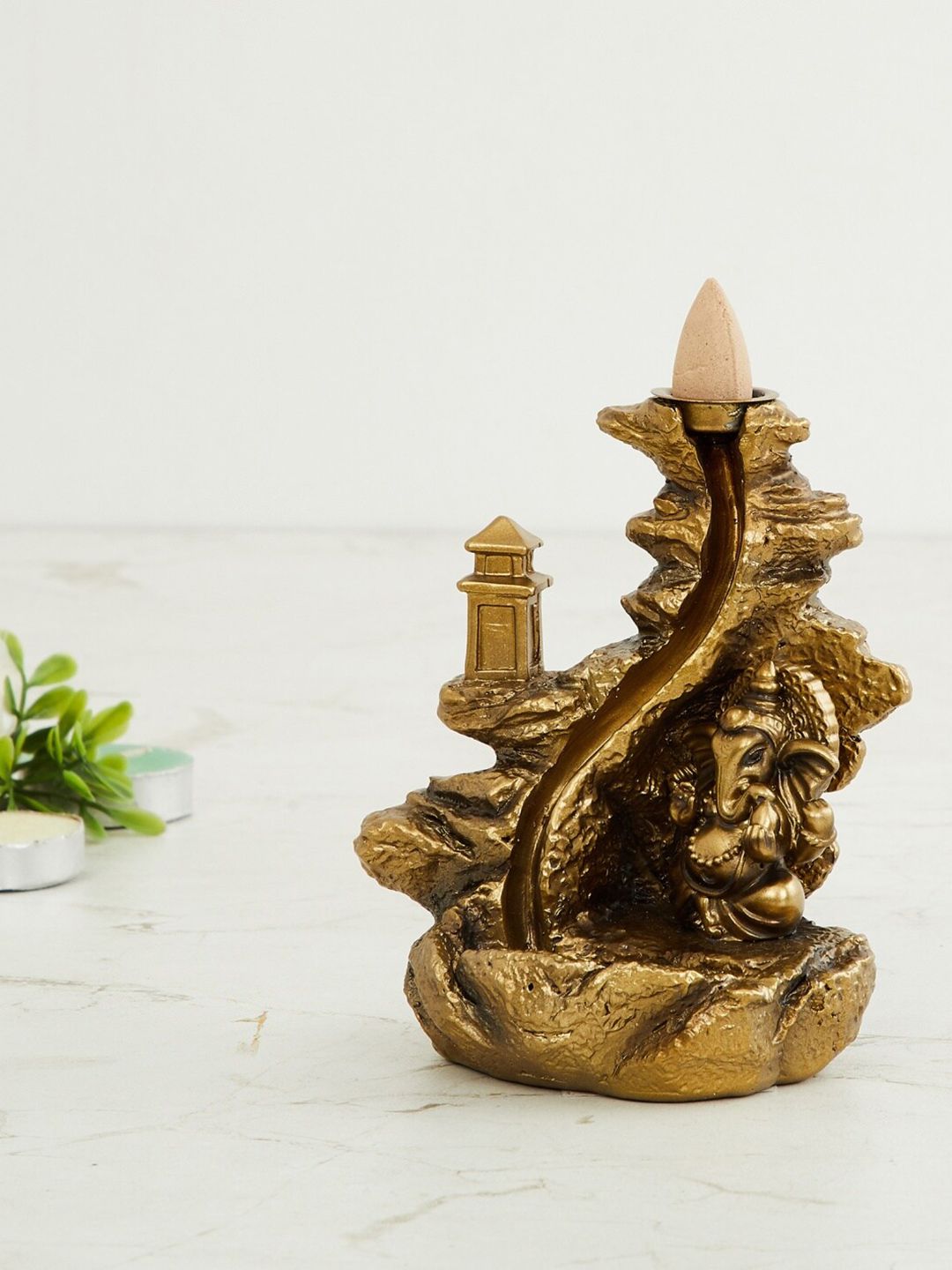 Home Centre Gold-Toned Tranquil Polyresin Ganesha Incense Holder Showpiece Price in India