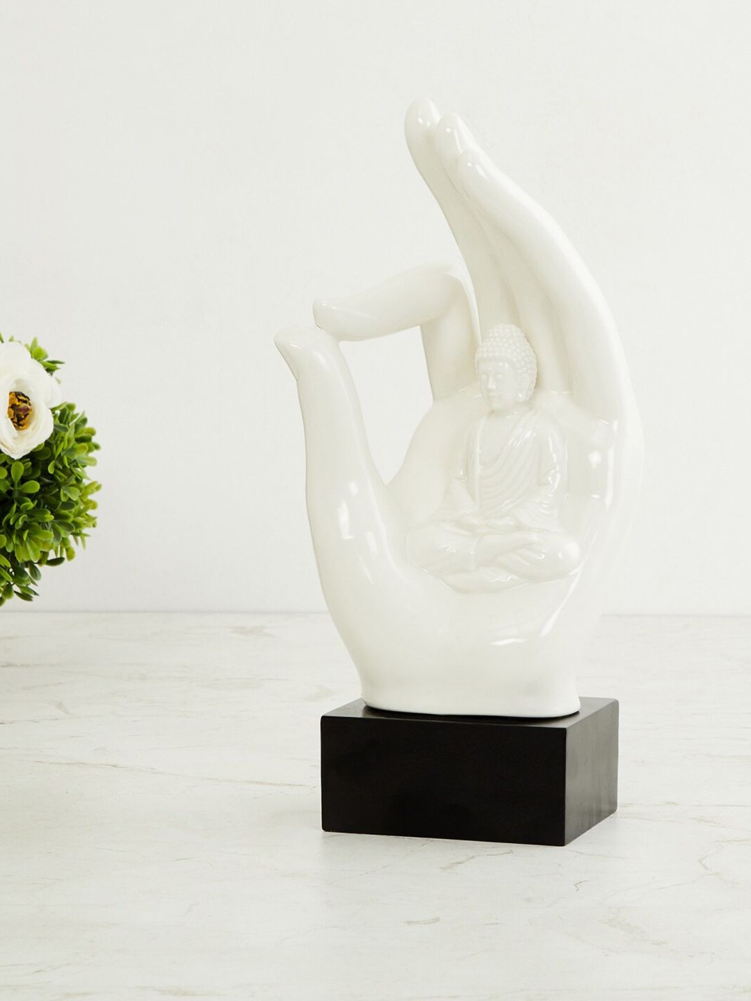 Home Centre White & Black Ceramic Buddha Hand Figurine Showpiece Price in India