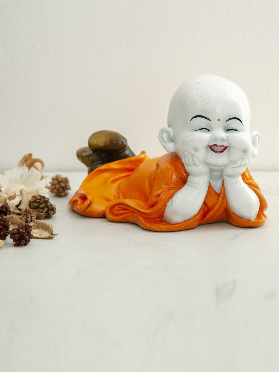 Home Centre White & Orange Corsica Monk Figurine Price in India