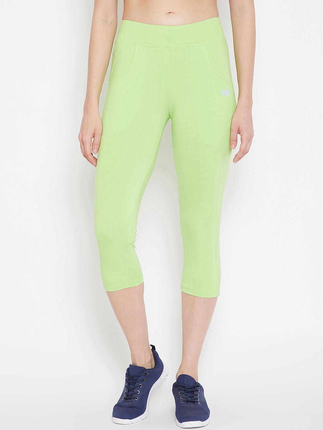 Clovia Women Lime Green Solid Snug Fit Active Capri Tights Price in India