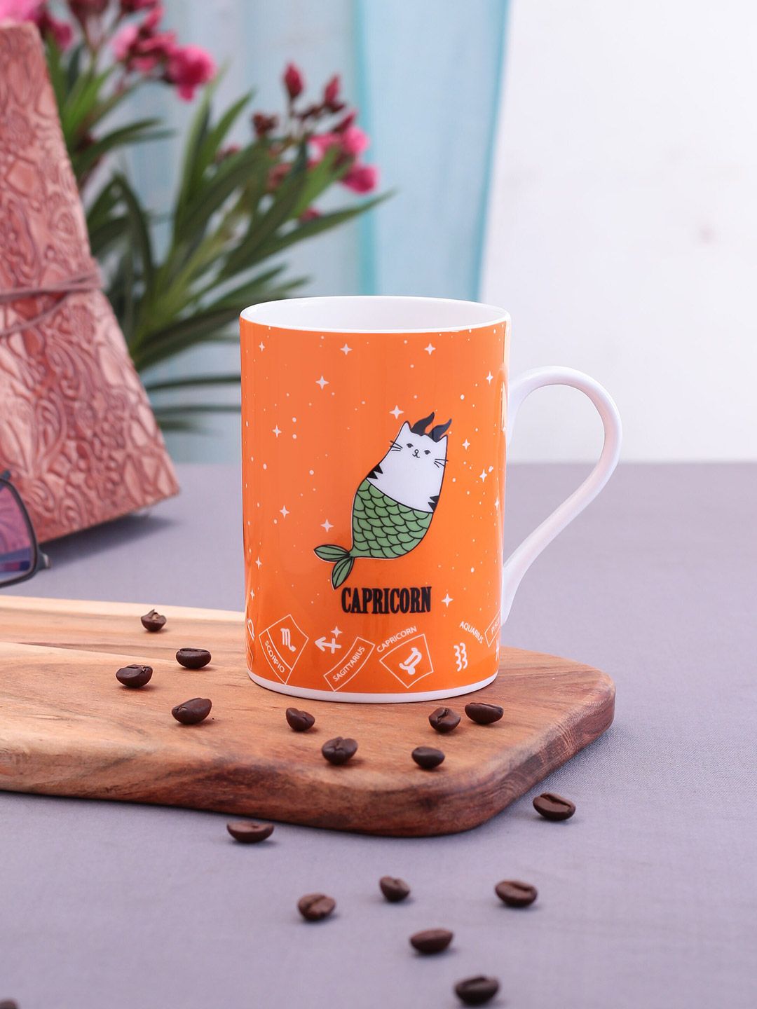 CLAY CRAFT Orange & White Capricorn Zodiac Printed Ceramic Glossy Mug Price in India