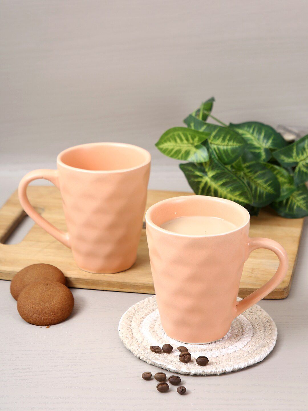 Aapno Rajasthan Set Of 2 Peach Textured Ceramic Glossy Mugs Price in India