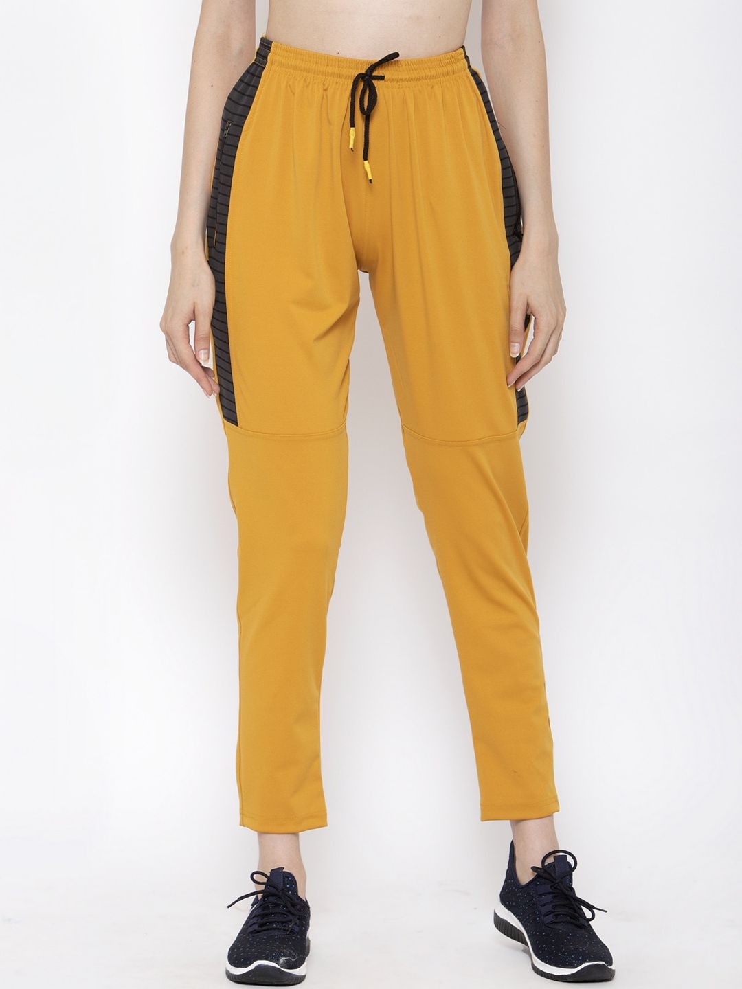 KLOTTHE Women Mustard Yellow Solid Slim-Fit Track Pants Price in India