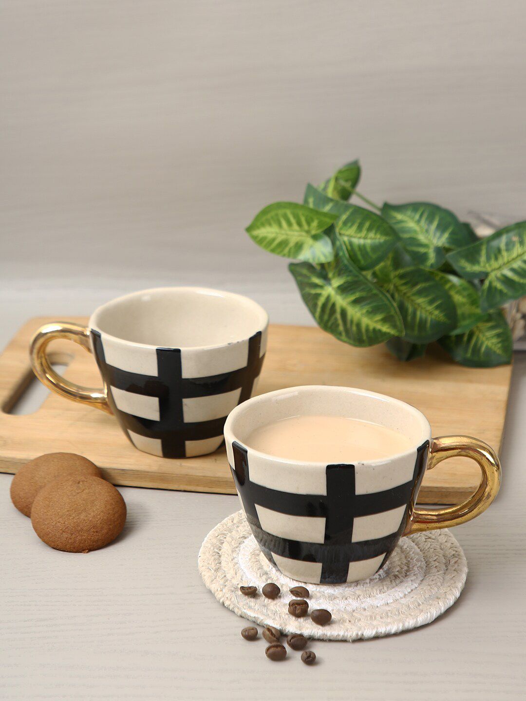 Aapno Rajasthan Set Of 2 White & Black Textured Ceramic Glossy Mugs Price in India