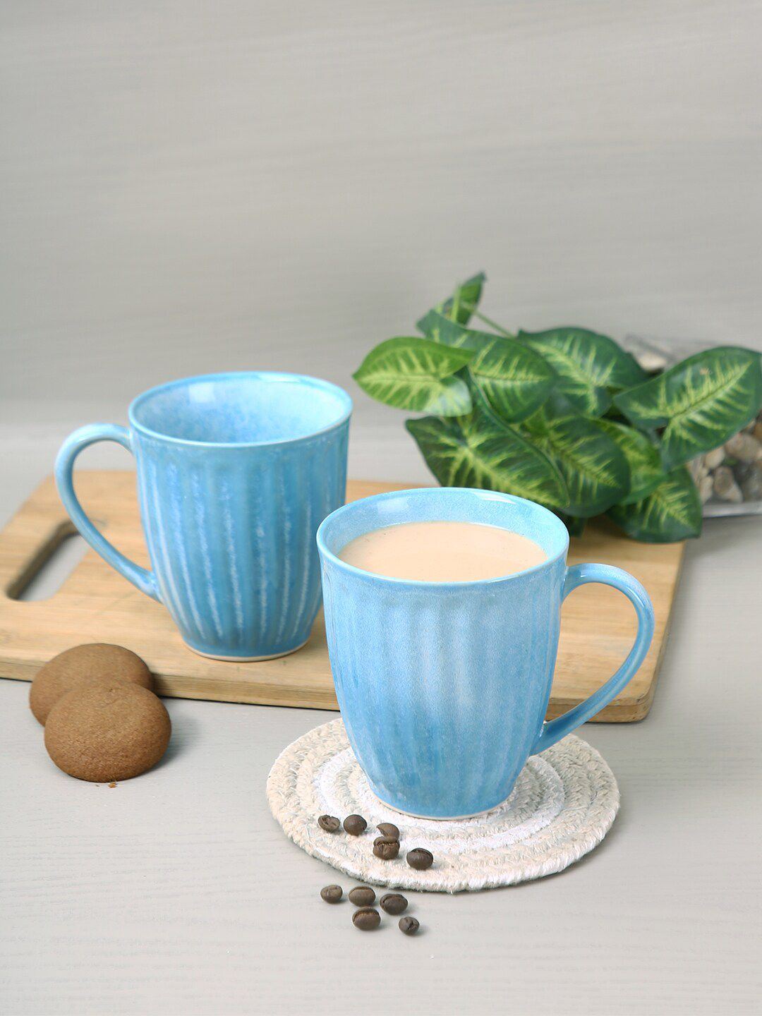 Aapno Rajasthan Set Of 2 Turquoise Blue Textured Ceramic Glossy Mugs Price in India