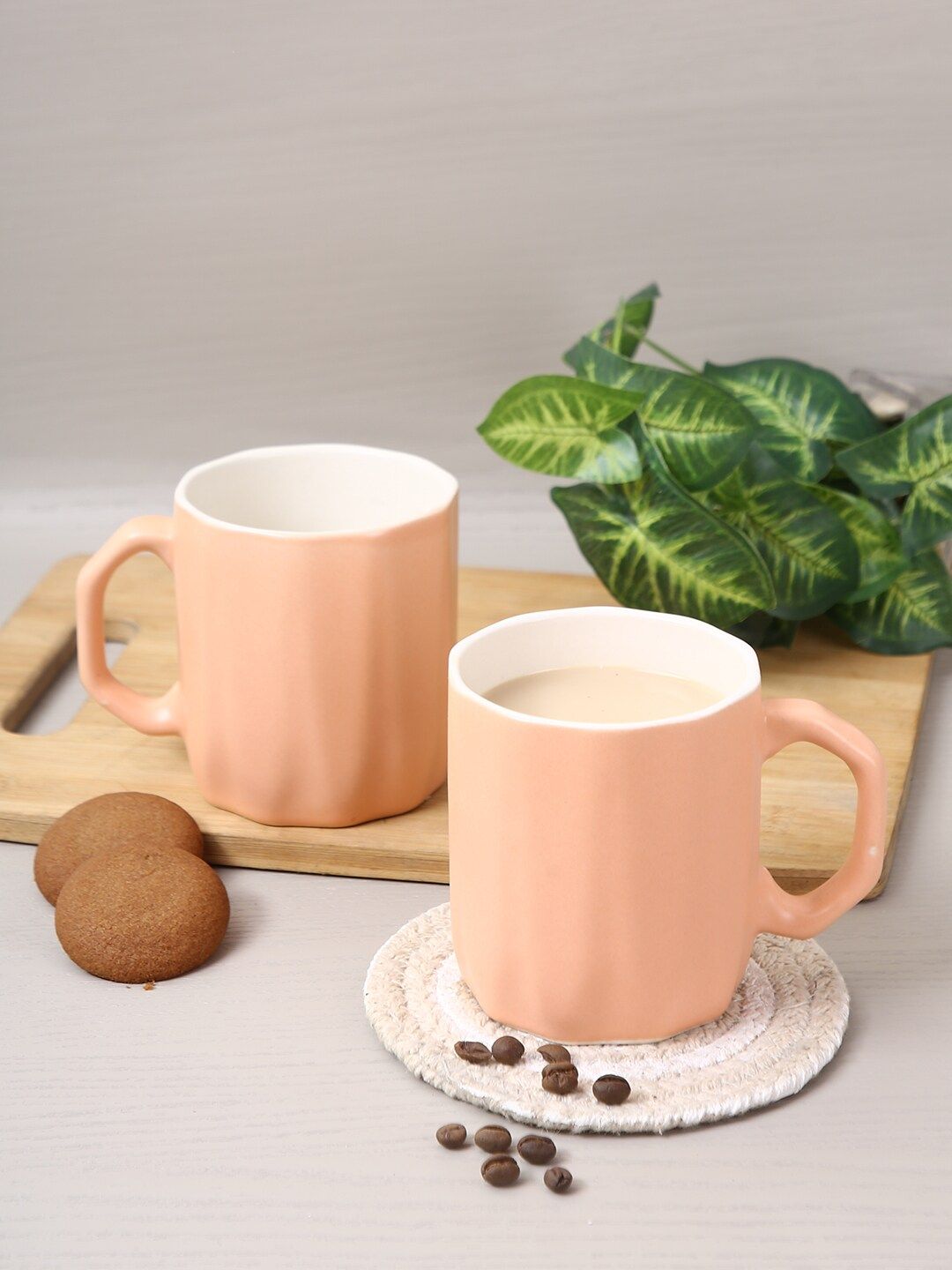 Aapno Rajasthan Set Of 2 Peach-Coloured Textured Ceramic Glossy Coffee Mugs Price in India