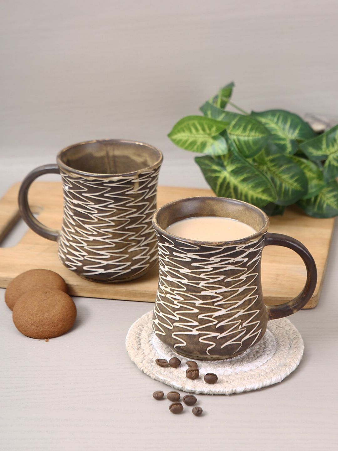 Aapno Rajasthan Set Of 4 Brown Textured Ceramic Glossy Mugs Price in India