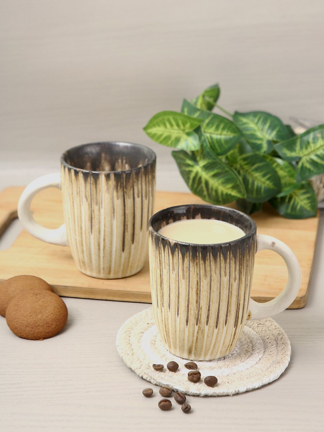 Aapno Rajasthan Set Of 2 Beige Textured Ceramic Glossy Mugs Price in India