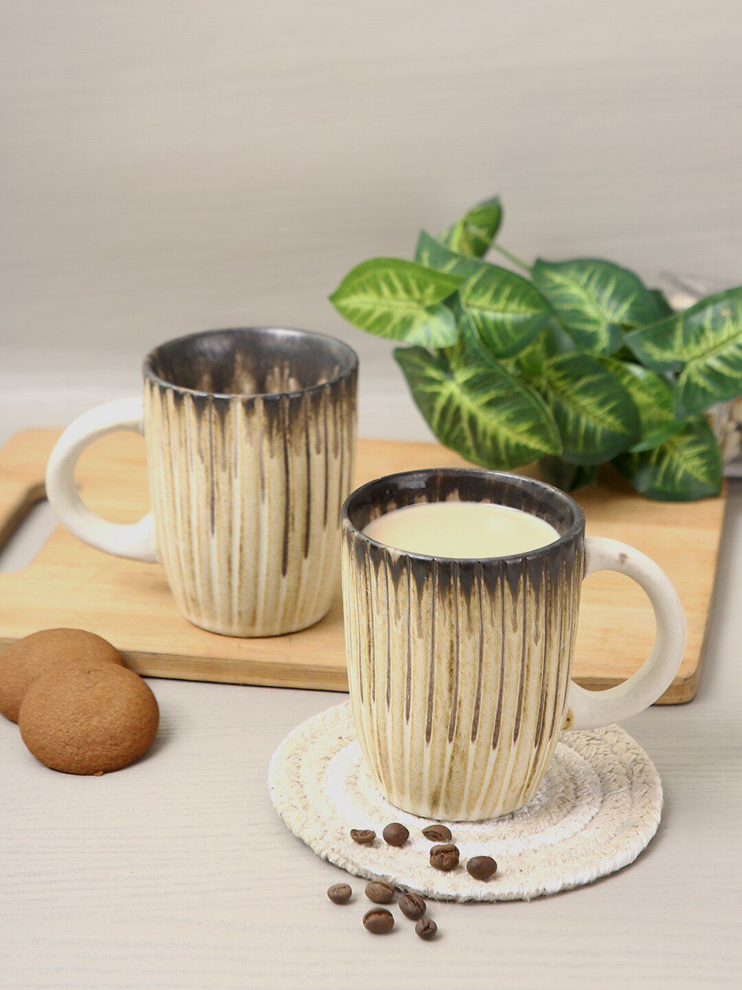 Aapno Rajasthan Set Of 4 Beige Textured Ceramic Glossy Mugs Price in India