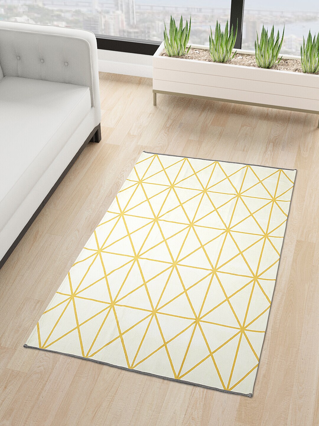 Living scapes by Pantaloons Off White & Yellow Geometric Printed 110 GSM Cotton Bath Rug Price in India