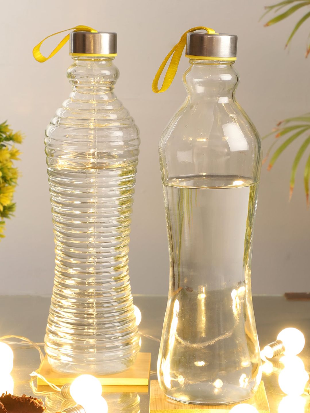 ceradeco Set Of 2 Transparent Plain & Spiral Glass Fridge Water Bottles Price in India