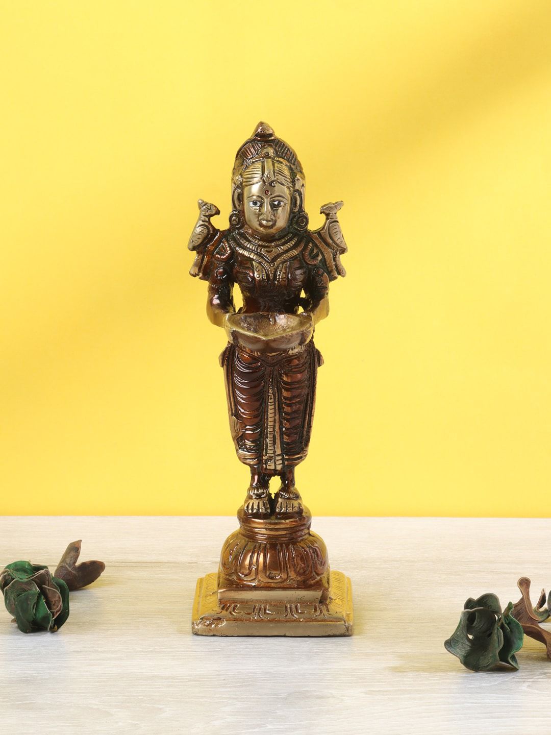 Aapno Rajasthan Brown & Gold-Toned Handcrafted Brass Goddess Laxmi Showpiece Price in India