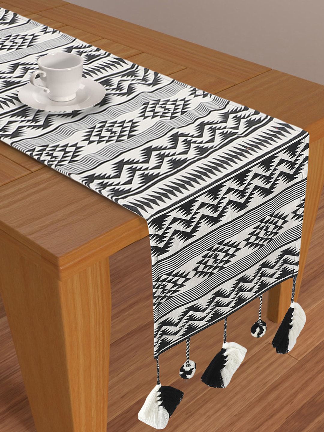 Mezposh Black & White Chevron Printed Jacquard 4 Seater Table Runner With Tassels Price in India