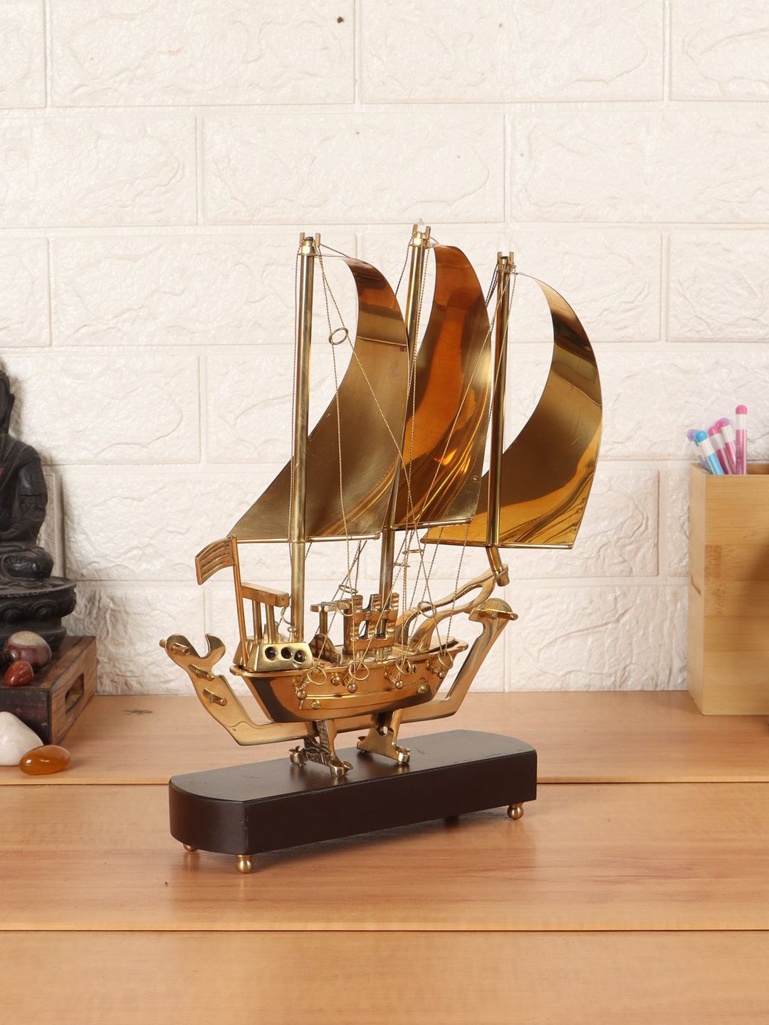EXIM DECOR Brown & Gold-Toned Sailing Ship With Wooden Stand Showpiece Price in India
