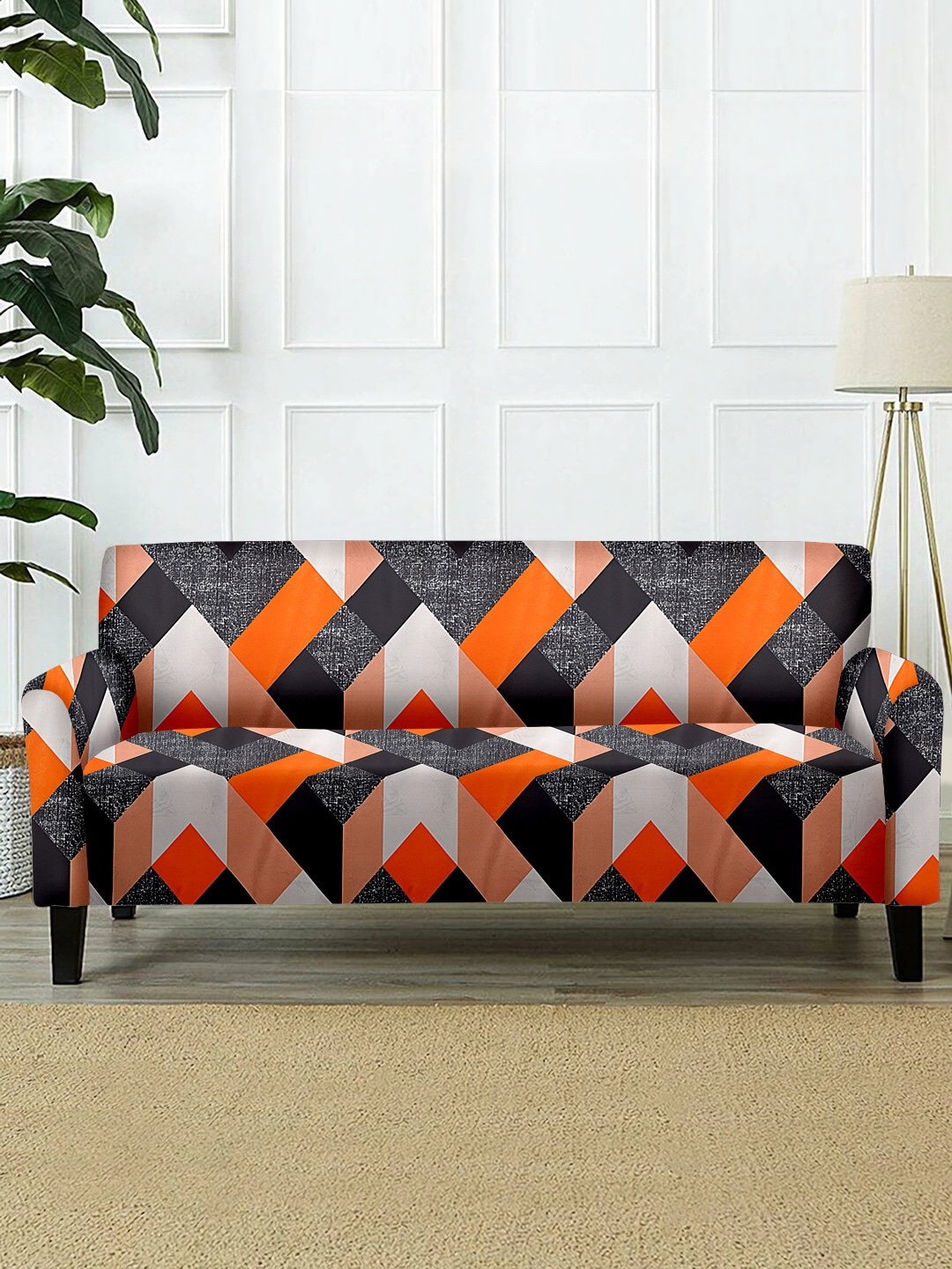 Cortina Orange & Black Geometric Printed 2-Seater Super-Stretchable Non-Slip Sofa Slipcover Price in India