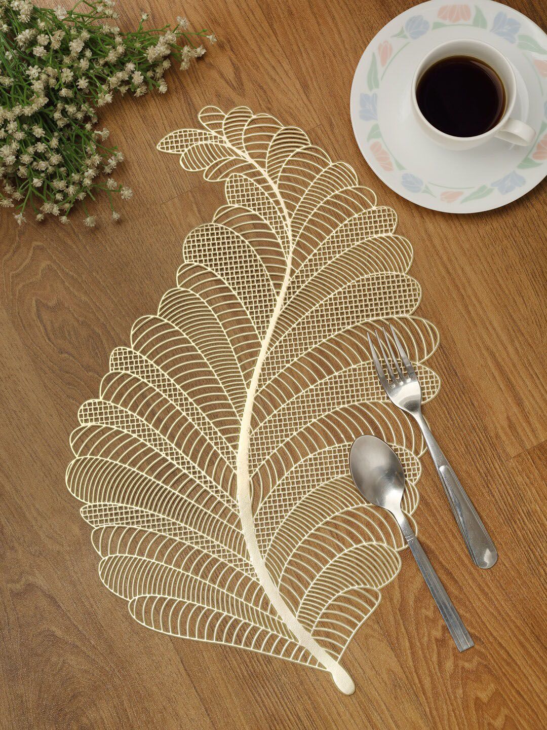 HOSTA HOMES Set Of 6 Gold-Toned Solid Designer Leatherite Leaf Shaped Table Placemats Price in India
