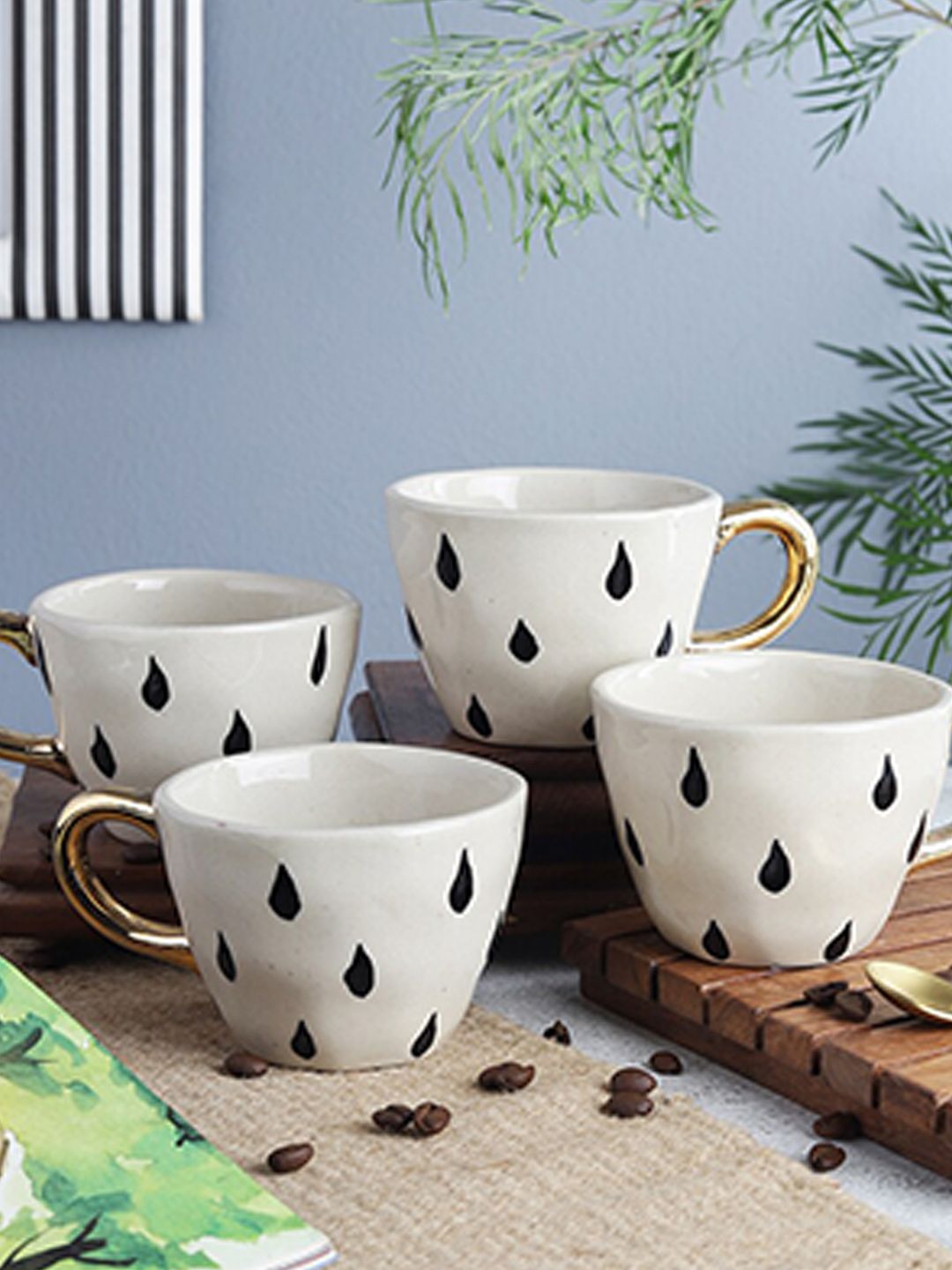 The Decor Mart White & Black Printed 4 Ceramic Glossy Cups Set Price in India