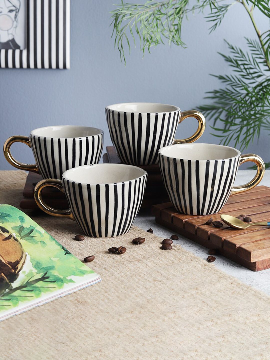 The Decor Mart Set Of 4 Off White & Black Printed Ceramic Glossy Cups Price in India