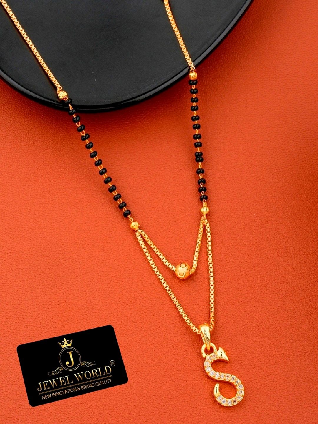 JEWEL WORLD Gold-Plated & Black Stone-Studded & Beaded Alphabet S Charm Mangalsutra